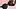 Schwarzer, gut sitzender BH für große Größen auf rosa Hintegrund - Foto: iStock/undefined undefined