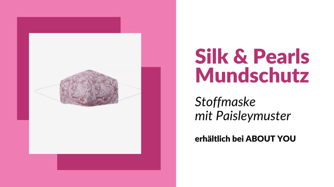 Mundschutz mit Paisleymuster Schutzmaske mit Paisleymuster auf weißem Hintergrund